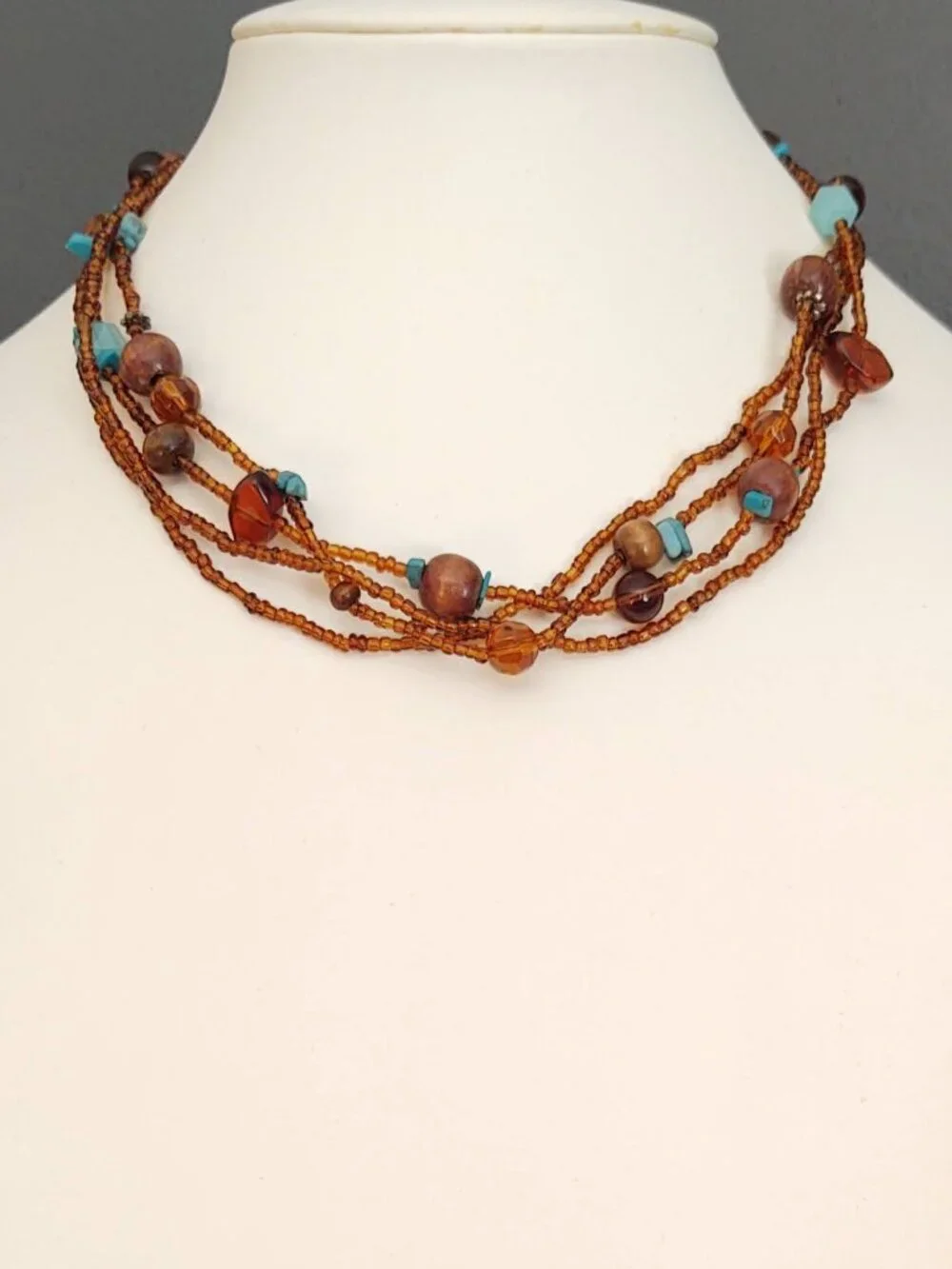 Amber and blue tones-seed bead and wood bead multi strand necklace